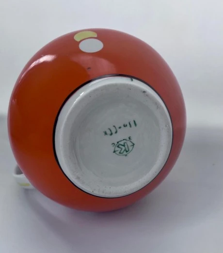קנקן קטן מפורצלן כתום